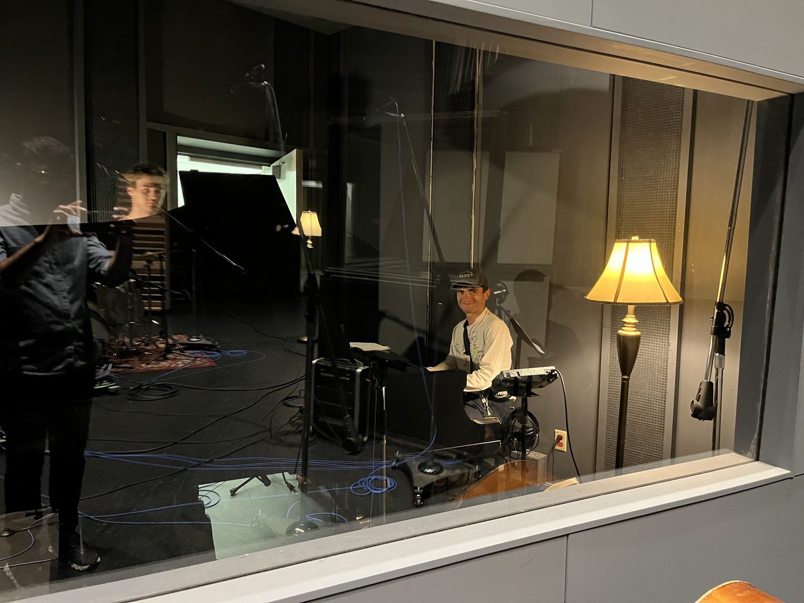 The piano booth seen through the studio glass