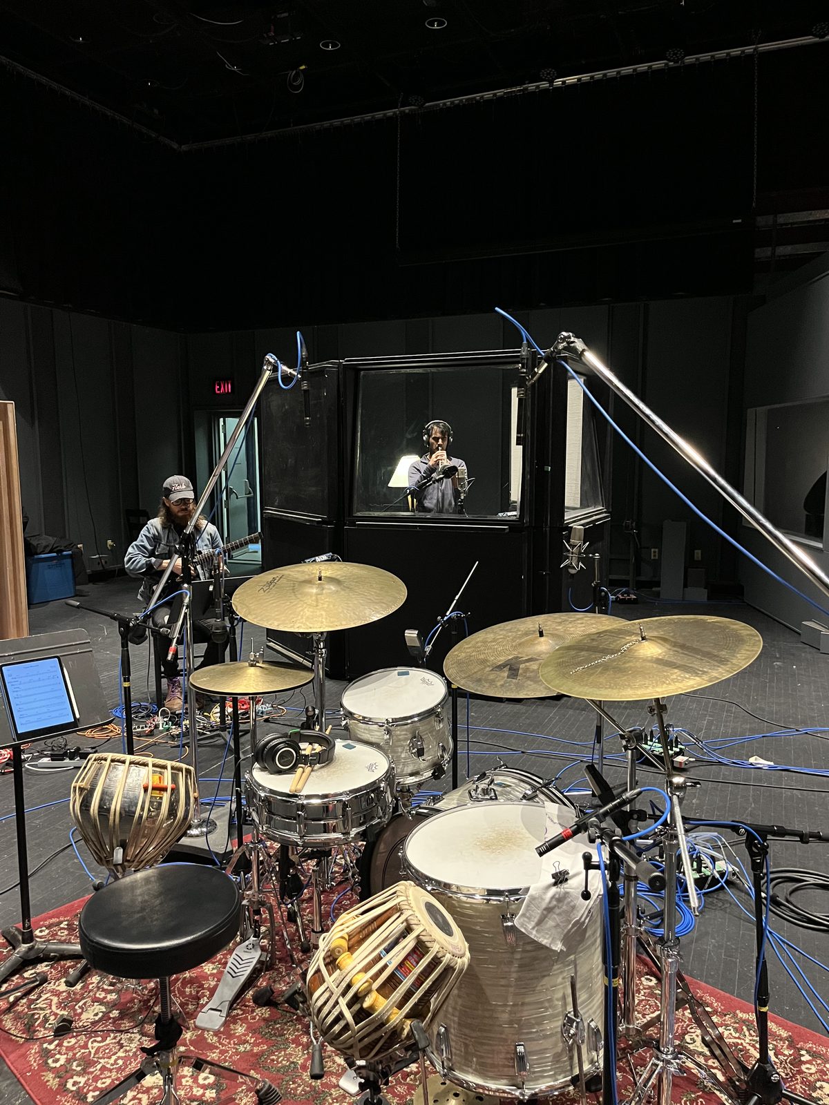 The drum kit and tabla set up in the live room